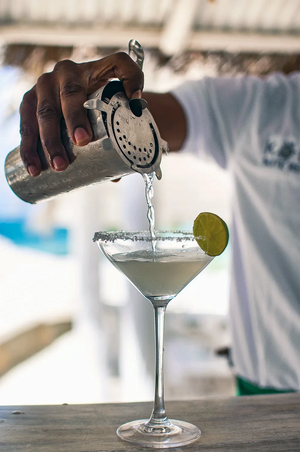 Bartender preparing a cocktail at Kobe Suite Resort