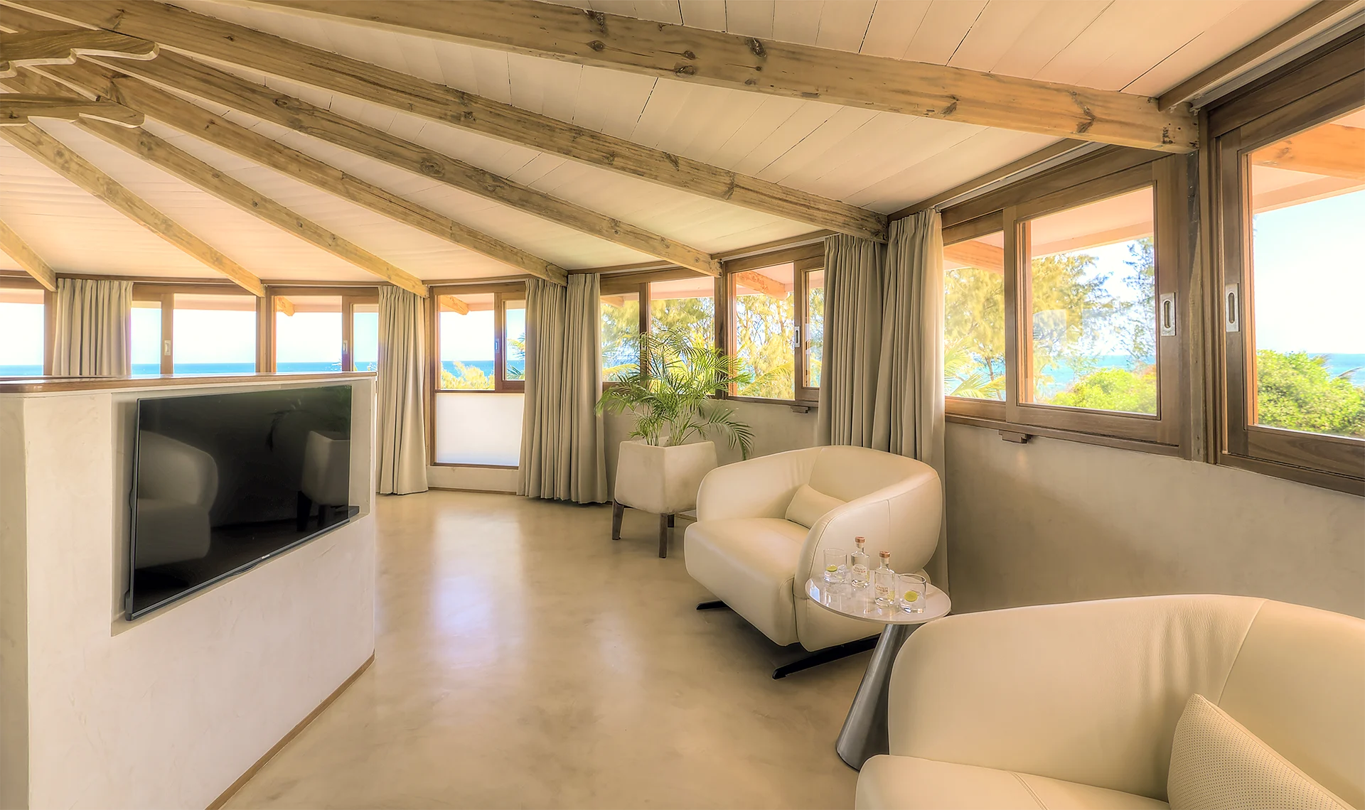 Presidential Ocean View Suite living area with panoramic ocean views