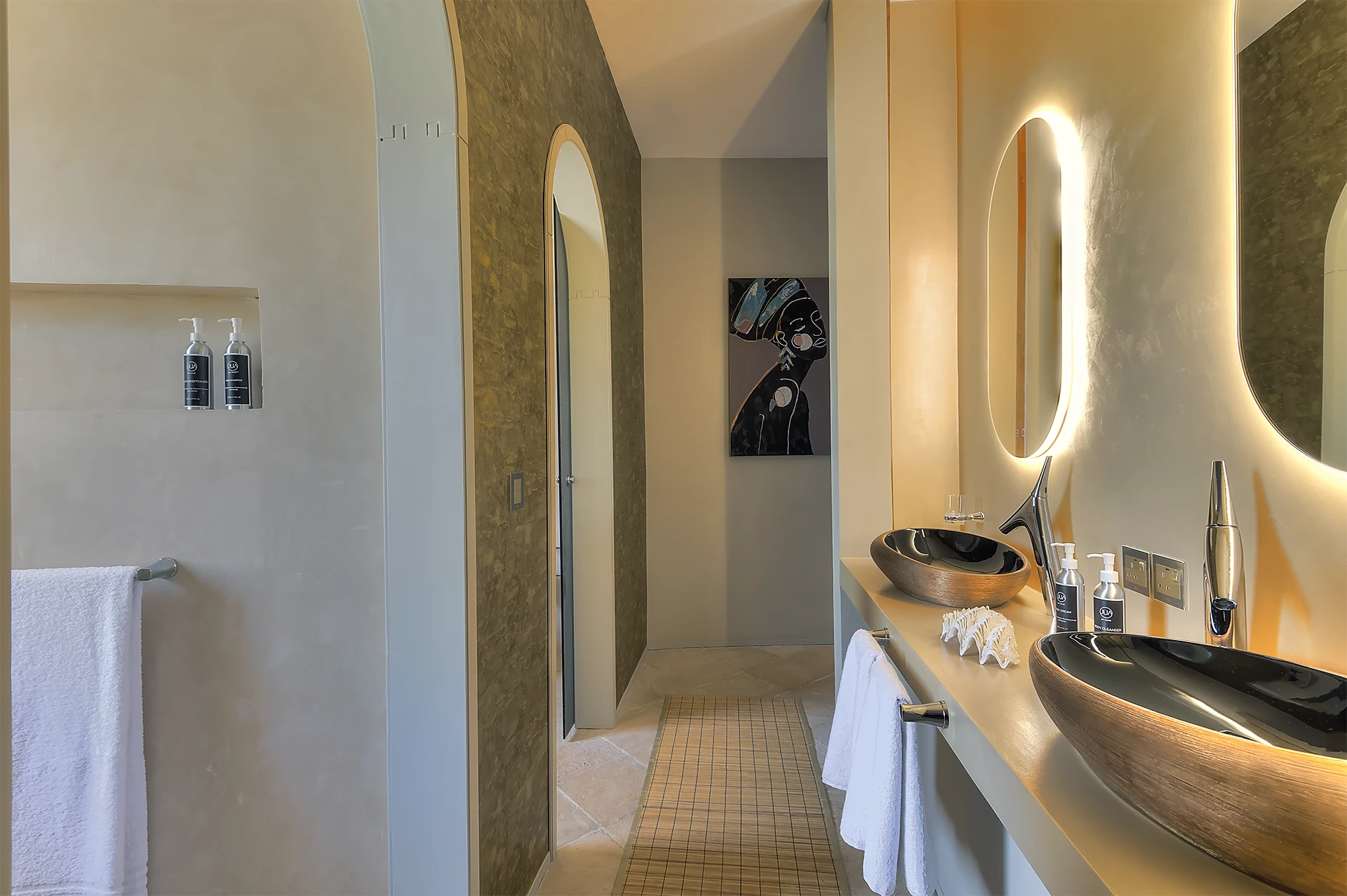 Presidential Ocean View Suite bathroom with double vessel sinks and walk-in shower