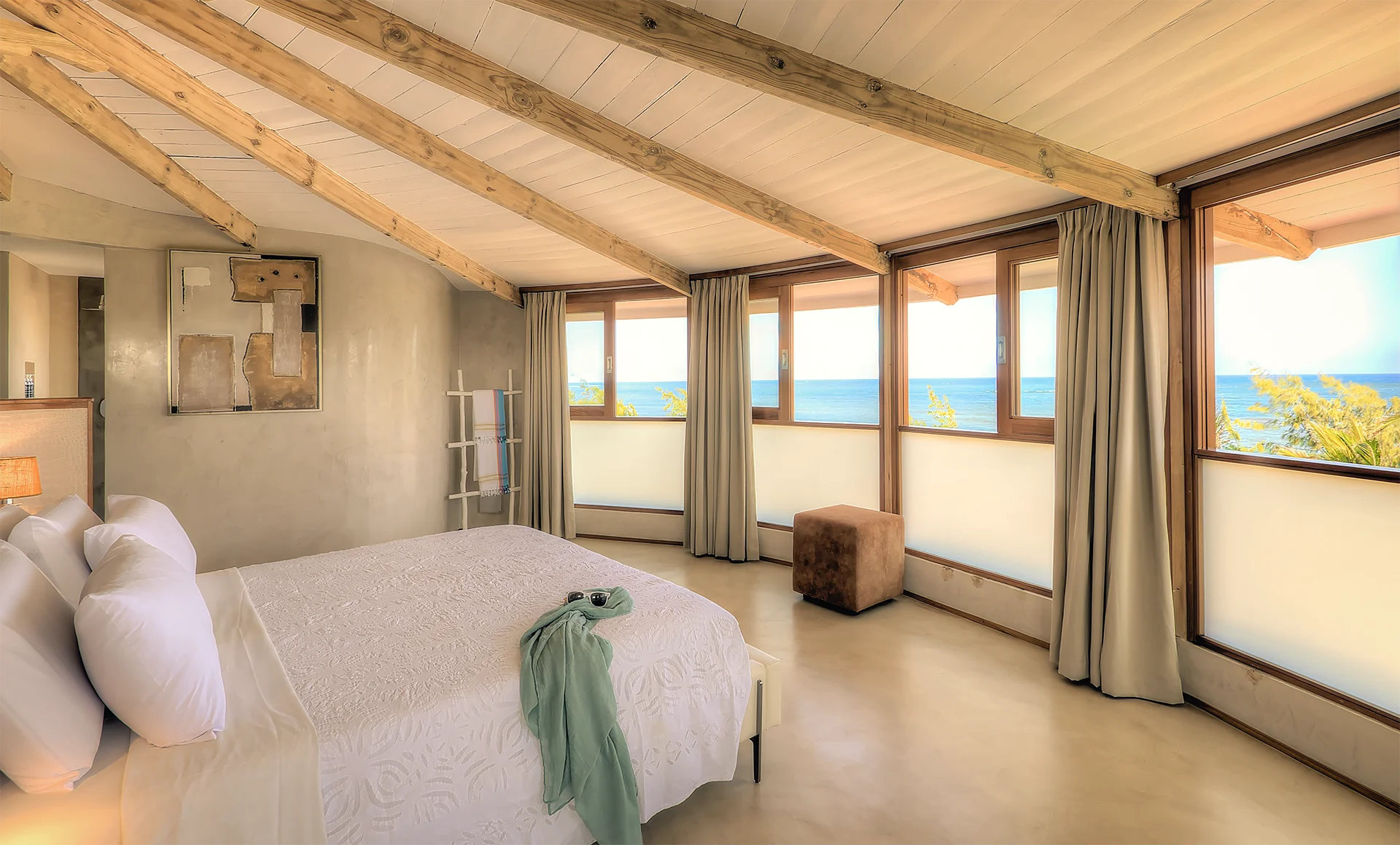 Presidential Ocean View Suite bedroom with panoramic views of the Indian Ocean