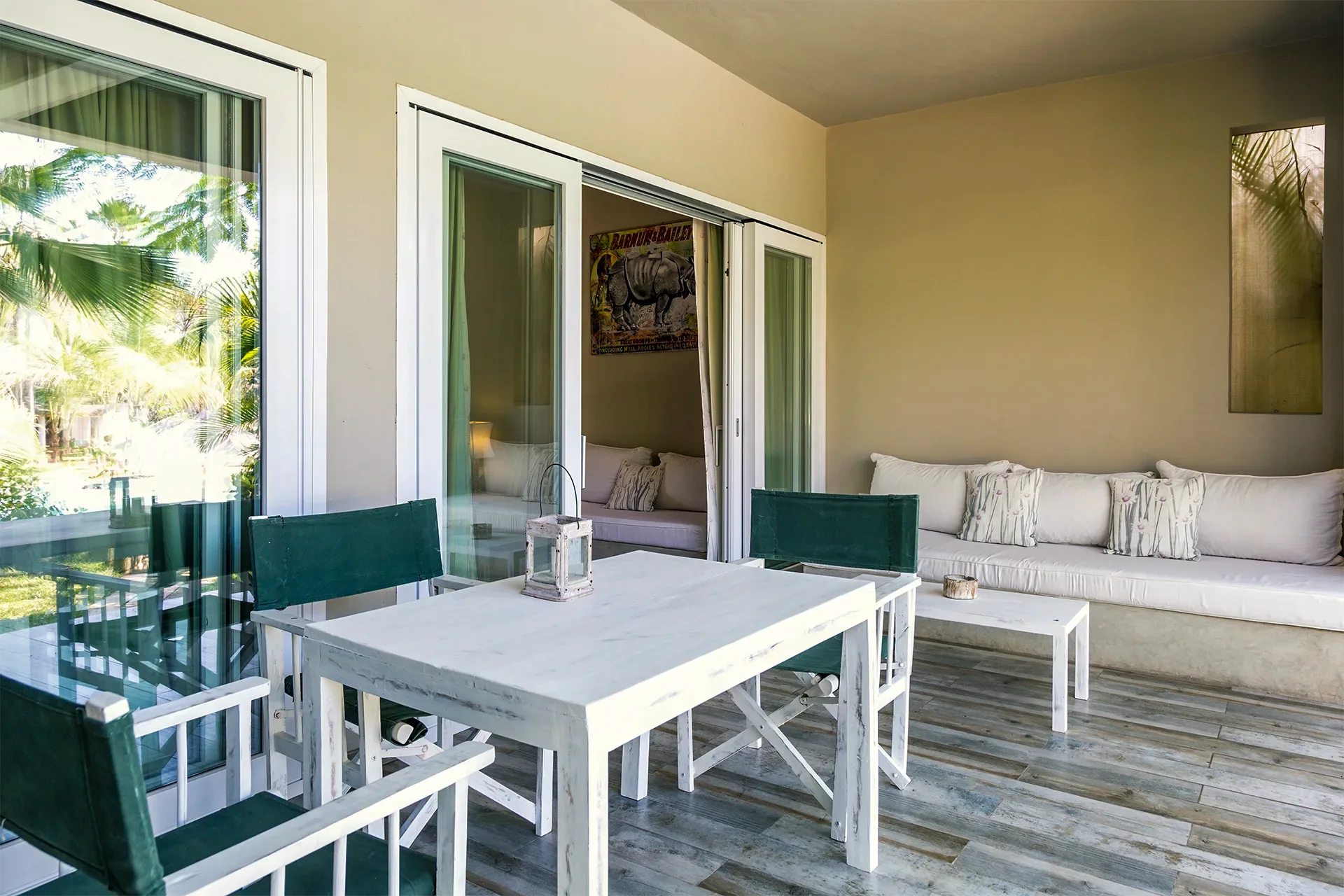 Private outdoor dining and seating area at the Deluxe Garden View Suite