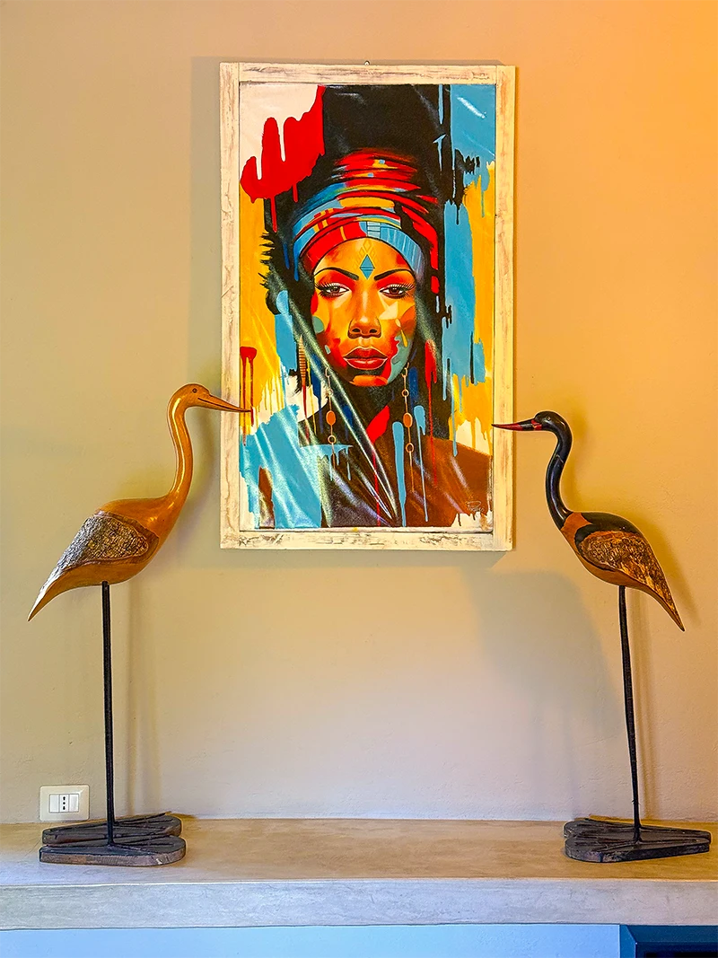 African-inspired artwork and decorative bird sculptures in the Standard Garden View Suite