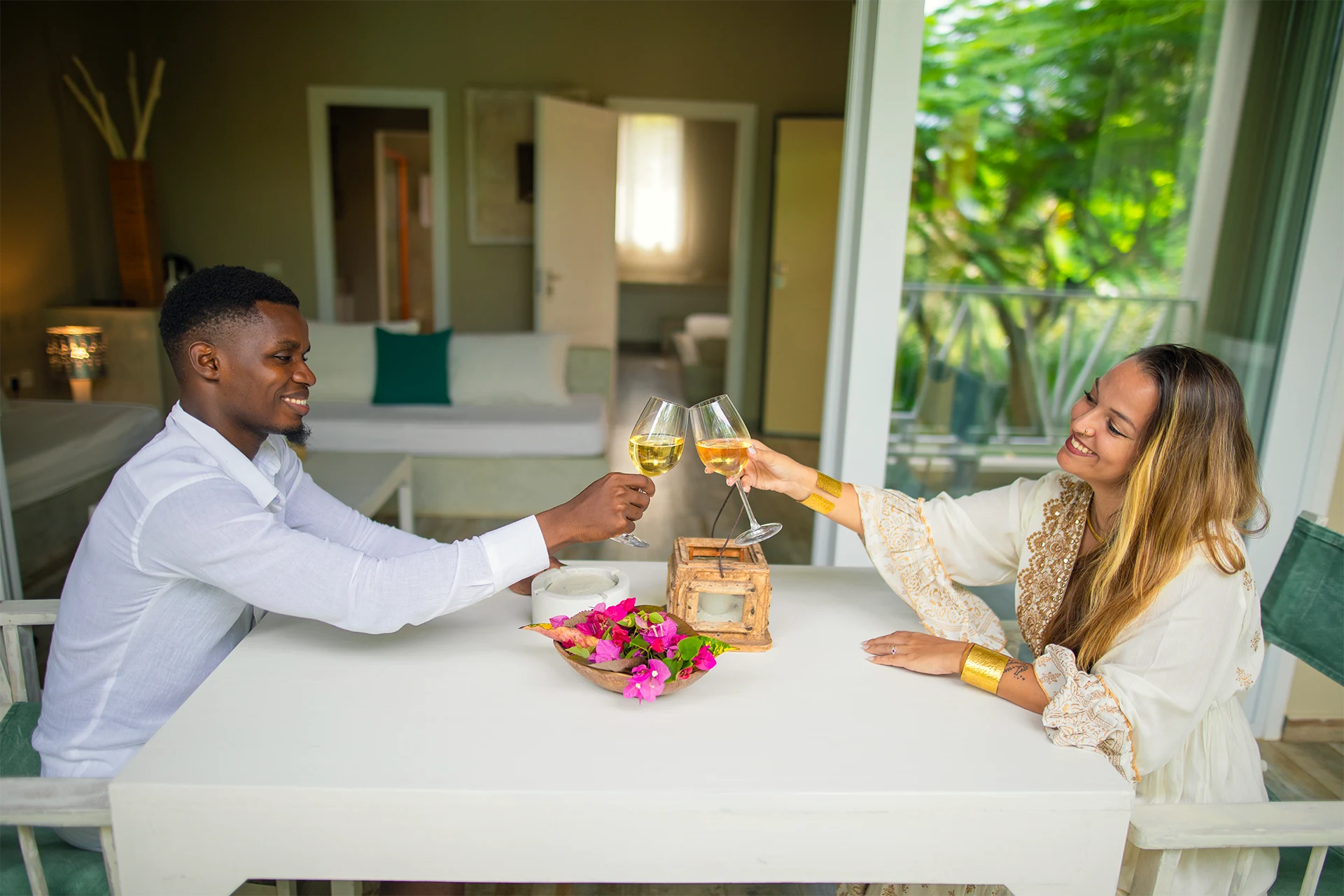 Couple enjoying Kobe Suite Resort Standard Garden Suite living area