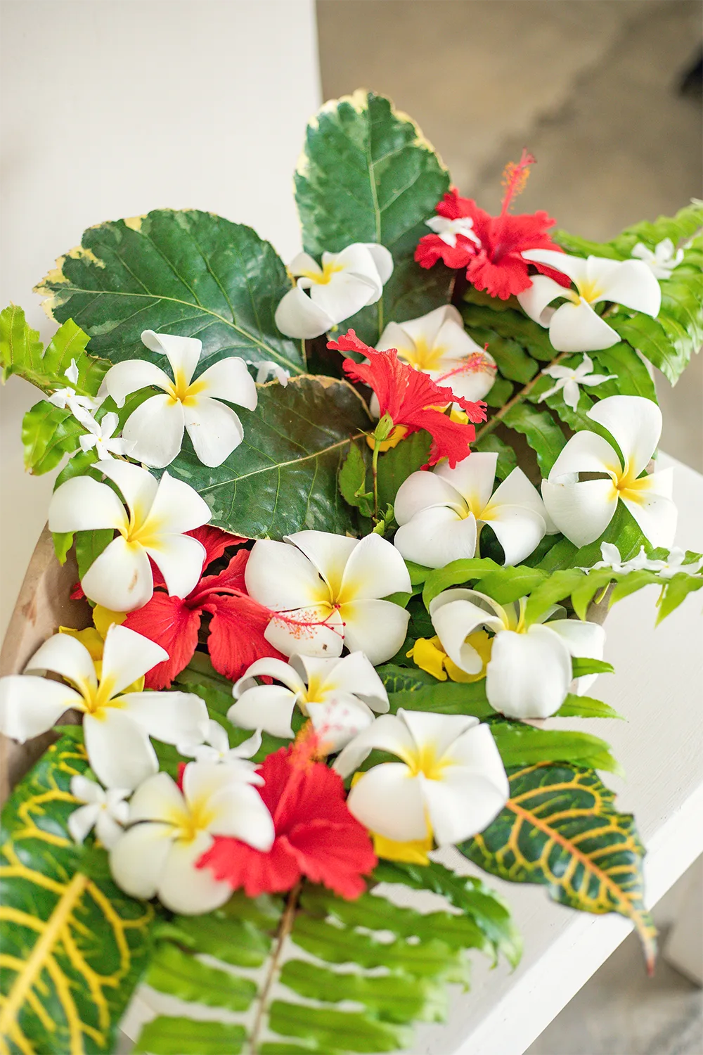Tropical flower welcome arrangement prepared for resort guests
