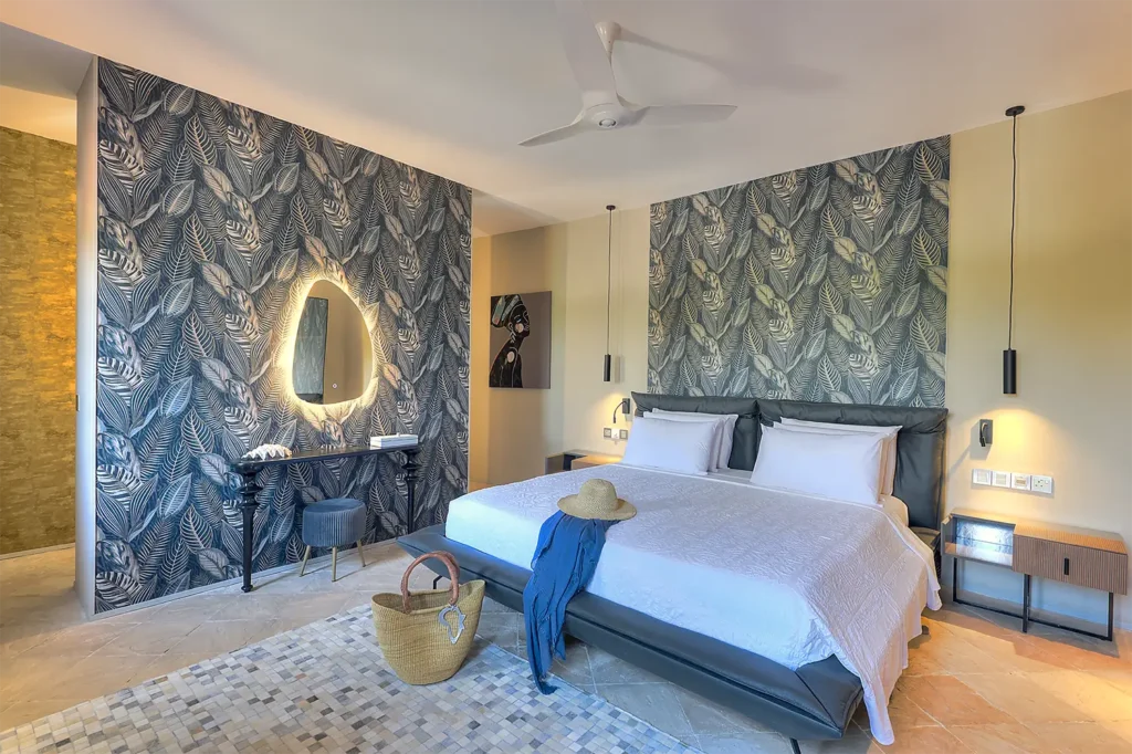Presidential Ocean View Suite bedroom with elegant tropical-inspired interiors