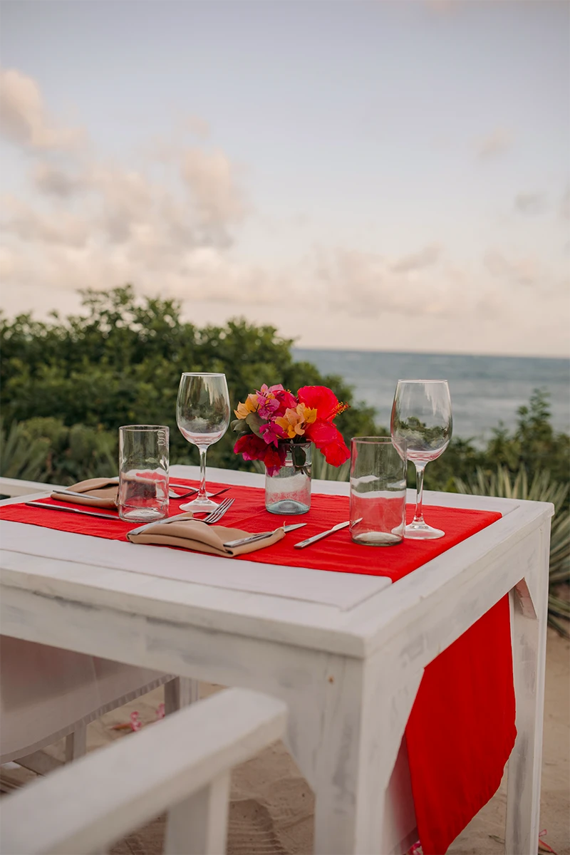 Private event table set for dinner overlooking the Indian Ocean