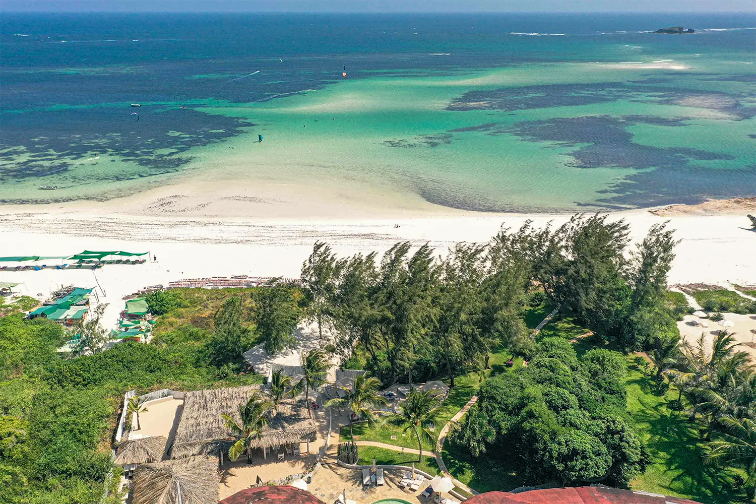 Aerial view of Kobe Suite Resort overlooking the white sands and turquoise waters of Watamu