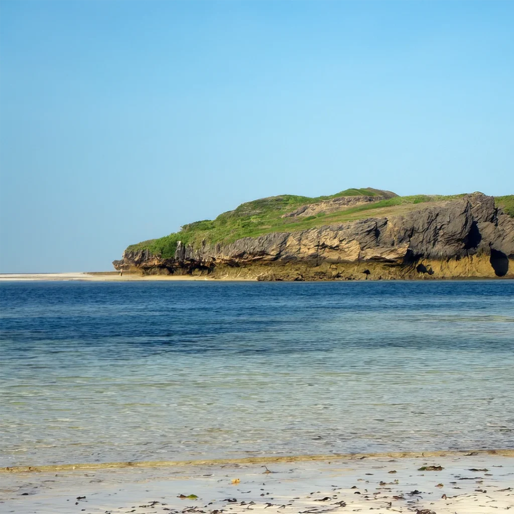Rocky island and turquoise waters along the coast of Watamu, Kenya