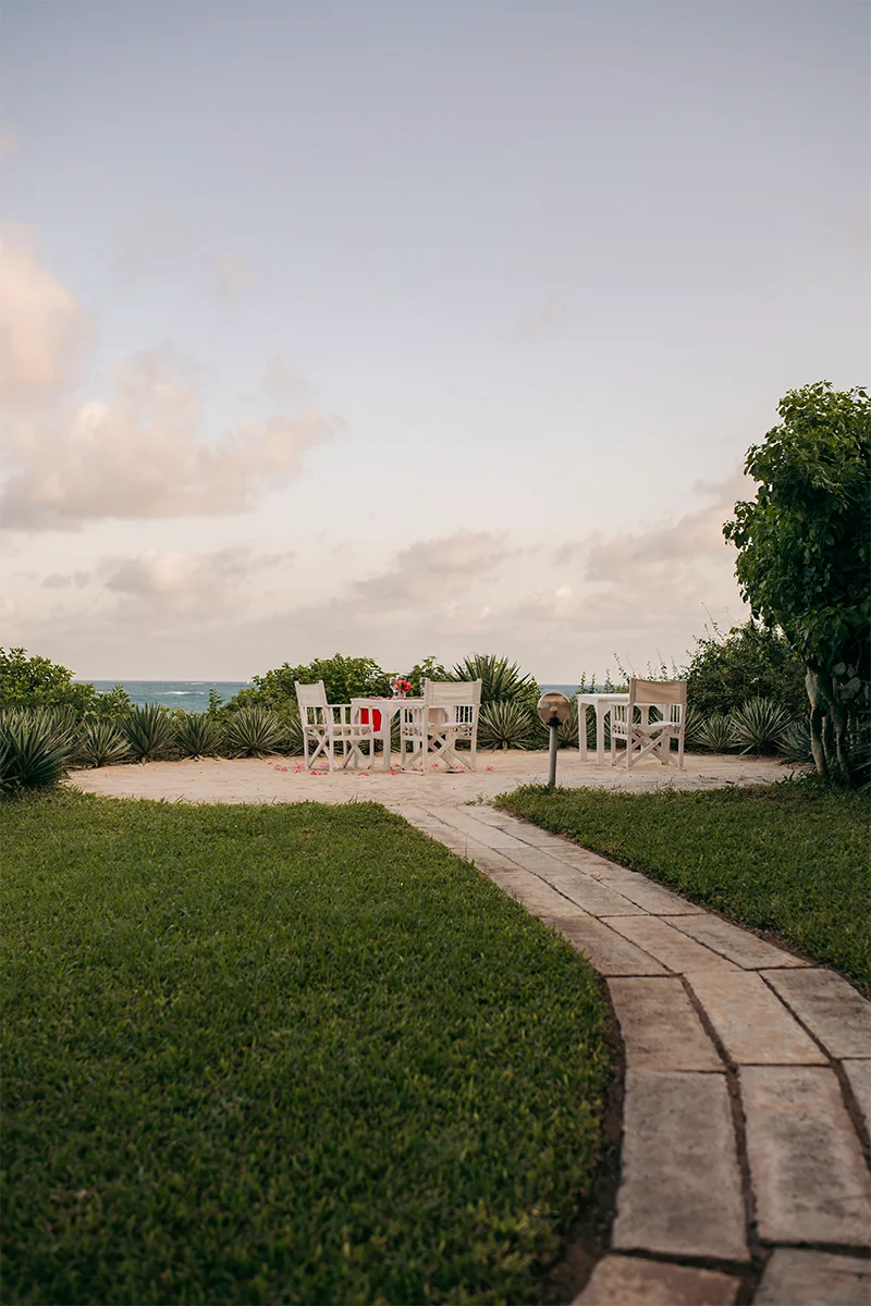 Private event setup with outdoor tables overlooking the Indian Ocean